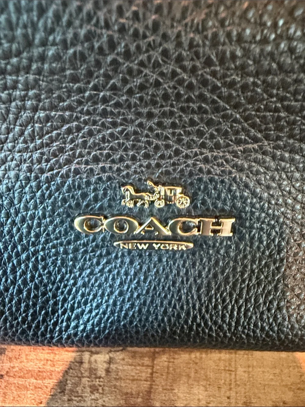 Coach Black Pebbled Leather Backpack with Gold-Tone Accents